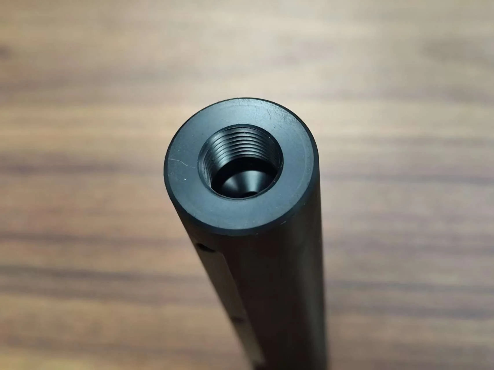 Internal M15 thread detail on a black POM cylindrical component