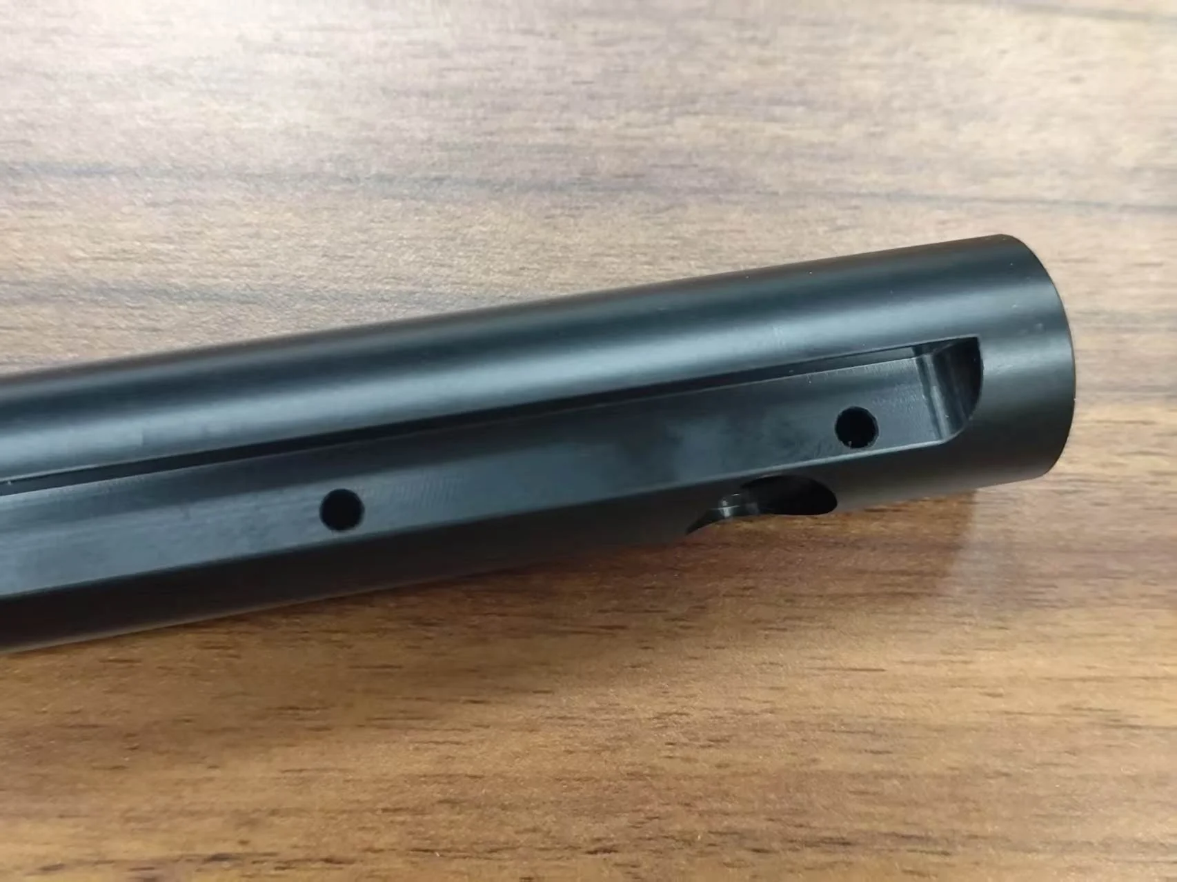 Precision machined POM cylindrical part with longitudinal milled feature